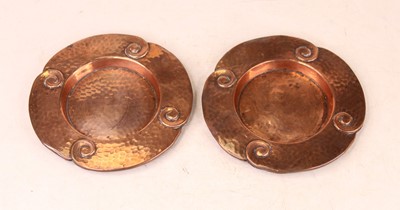 Lot 233 - A pair of Arts & Crafts beaten copper dishes,...