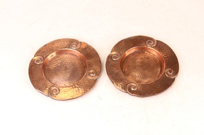 Lot 233 - A pair of Arts & Crafts beaten copper dishes,...