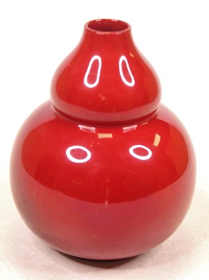 Lot 238 - A red flambe glazed vase, of double gourd form,...