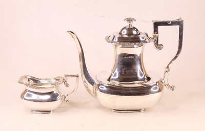 Lot 240 - An early 20th century silver coffee pot,...