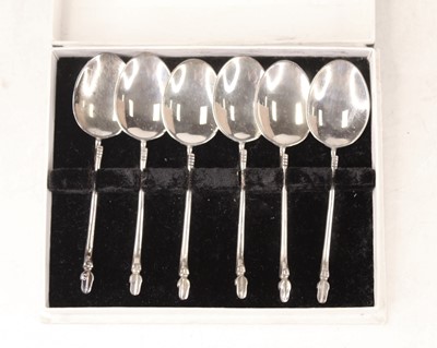 Lot 242 - A cased set of six white metal spoons,...