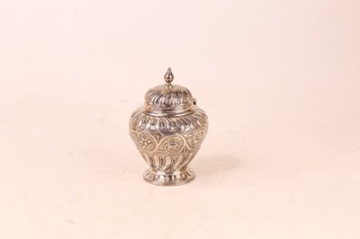 Lot 244 - A Victorian silver canister, the hinged domed...
