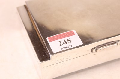 Lot 245 - An Art Deco white metal table cigarette box,...