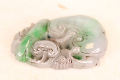 Lot 282 - A reproduction Chinese style faux jade carving