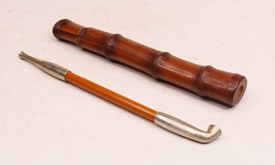 Lot 351 - A white metal mounted opium pipe in bamboo case