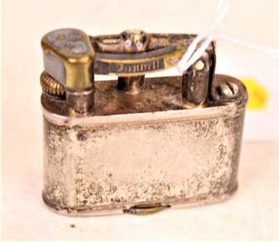 Lot 301 - A 1930s Dunhill silver pocket cigarette lighter