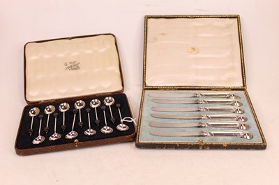 Lot 303 - A set of twelve mid-20th century silver coffee...