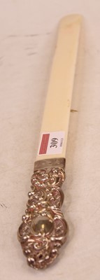 Lot 309 - A late Victorian ivory page-turner, the silver...