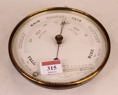 Lot 315 - An early 20th century brass cased barometer,...