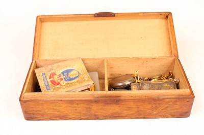 Lot 319 - An early 20th century oak glove-box and...