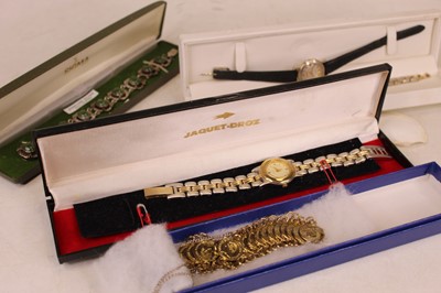 Lot 322 - A lady's silver bracelet, inset with nine jade...