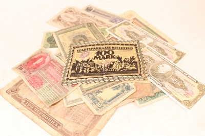 Lot 339 - A collection of world banknotes, to include...