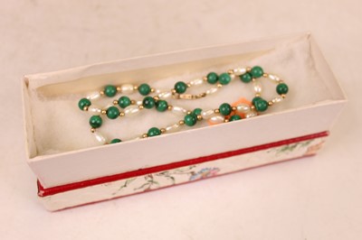Lot 363 - A pearl and malachite beaded necklace, with...