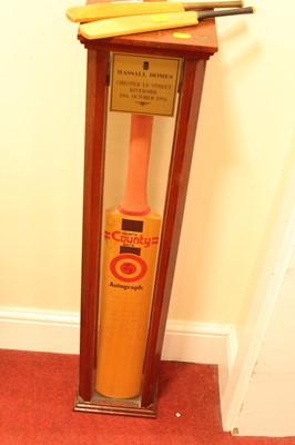Lot 539 - A Hunts County cricket bat signed by Geoffrey...
