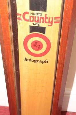Lot 539 - A Hunts County cricket bat signed by Geoffrey...