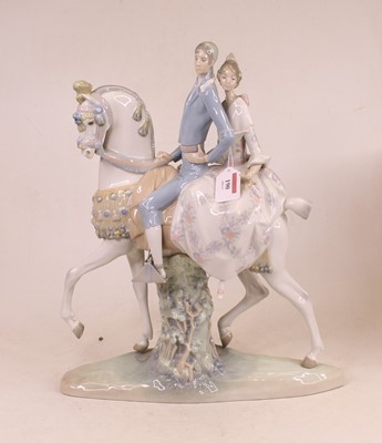 Lot 190 - A Lladro horse in cantering pose with rider...