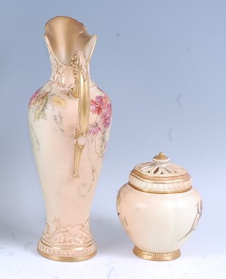 Lot 2034 - A Royal Worcester blushware ewer, decorated...