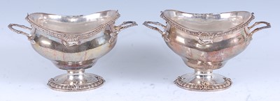 Lot 2175 - A pair of early George III silver pedestal...