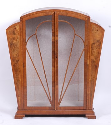 Lot 495 - An Art Deco figured walnut and crossbanded...