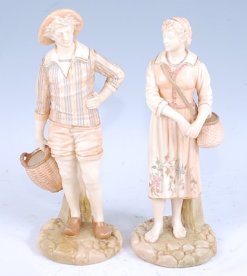 Lot 2041 - A pair of Royal Worcester blushware figures...