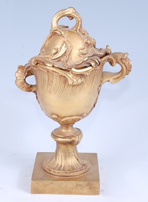 Lot 2434 - * A Rococo Revival gilt bronze twin handled...