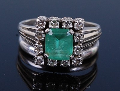 Lot 2338 - A white metal, emerald and diamond rectangular...
