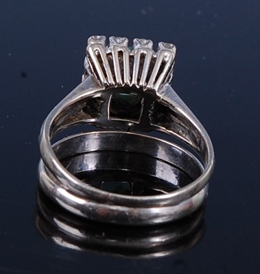 Lot 2338 - A white metal, emerald and diamond rectangular...