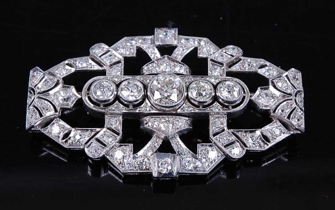 Lot 2339 - A white metal Art Deco diamond lozenge shaped...