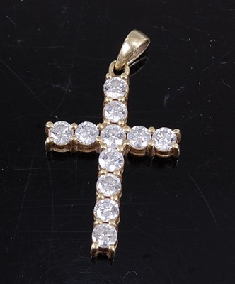 Lot 334 - An 18ct yellow gold diamond set cross pendant,...