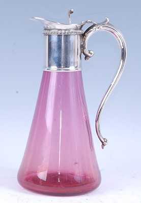 Lot 2201 - A circa 1900 cranberry glass claret jug,...