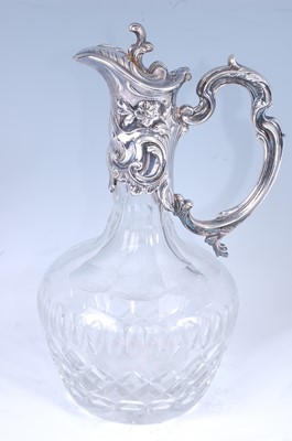 Lot 2218 - A Victorian style claret jug, having a facet...
