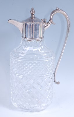 Lot 2219 - A 20th century claret jug, the clear glass...