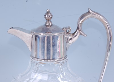 Lot 2219 - A 20th century claret jug, the clear glass...