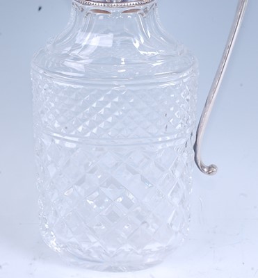Lot 2219 - A 20th century claret jug, the clear glass...