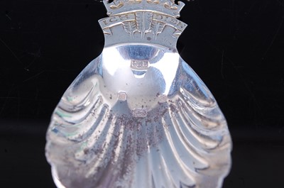 Lot 2098 - A George IV silver caddy spoon, having a shell...
