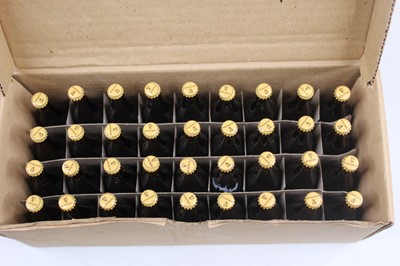 Lot 1517 - A collection of 67 Guinness miniature bottles,...