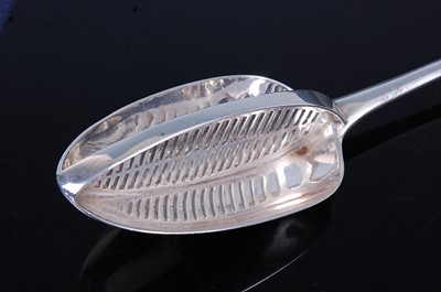 Lot 2115 - A George III silver straining spoon, in the...