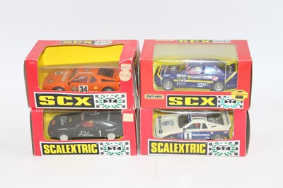 Lot 1444 - 4 Scalextric / SCX boxed models to include, No....