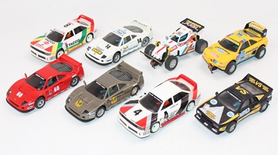 Lot 1446 - SCX group of 8 unboxed slot cars to include,...