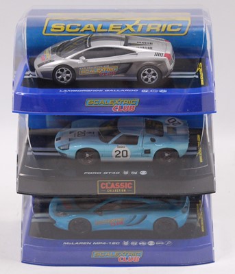 Lot 1451 - 3 boxed Scalextric super cars to include,...