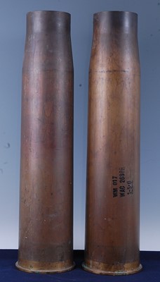Lot 133 - A pair of brass shell cases, each marked 105...