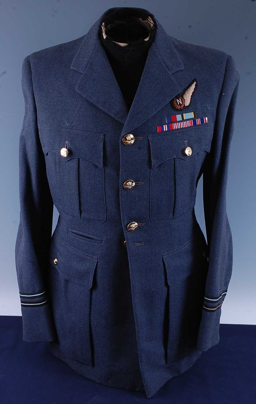 Lot 134 - A post WW II R.A.F. navigators dress tunic,...