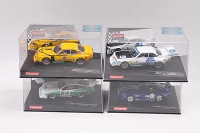 Lot 1457 - 4 boxed Carrera Evolution 1/32 scale slot cars...