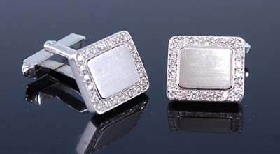 Lot 2312 - A pair of white metal diamond set rectangular...