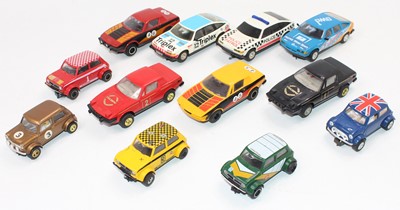 Lot 1466 - 12 various unboxed Scalextric slot cars to...