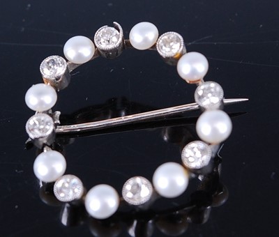 Lot 2318 - A white metal, pearl and diamond circular...