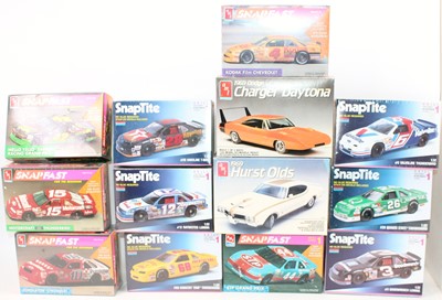 Lot 1481 - 13 various boxed AMT/ERTL 1/24th scale plastic...