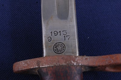 Lot 58 - A 1913 pattern Remington bayonet, the 43cm...