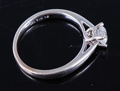 Lot 2321 - A 9ct white gold diamond single stone ring,...