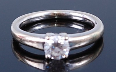 Lot 2322 - A white metal diamond single stone ring,...